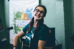 girl playing guitar